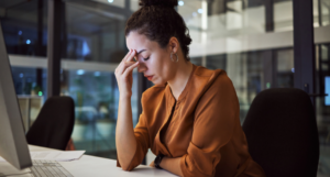 Person feeling stressed and experiencing the Sunday Night Blues