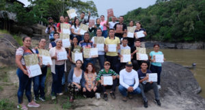 Diploma holders on the banks of the Guayabero River