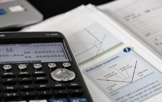 Calculator and maths text book