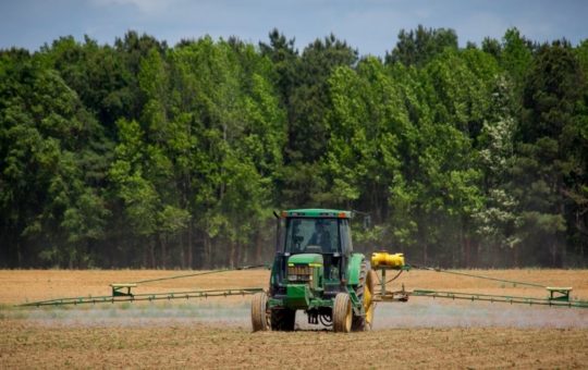 Tractor on croplands