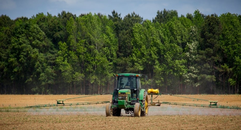 Tractor on croplands