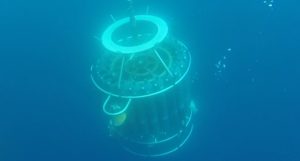 A large piece of scientific monitoring equipment pictured underwater