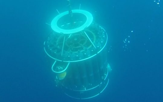 A large piece of scientific monitoring equipment pictured underwater