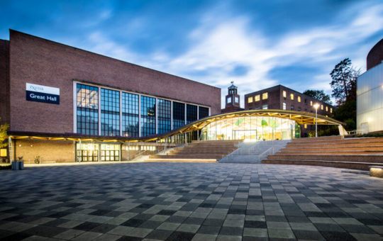 The Great Hall at the University of Exeter seen from outside at dusk