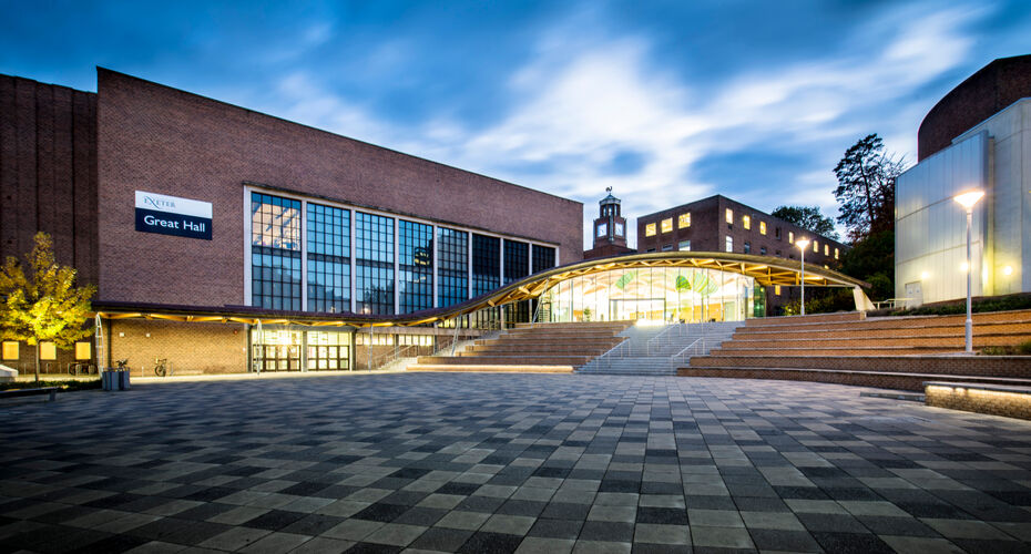 The Great Hall at the University of Exeter seen from outside at dusk