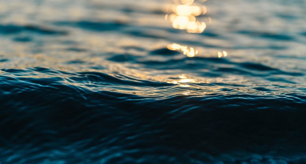 A closeup shot of ripples on the ocean surface