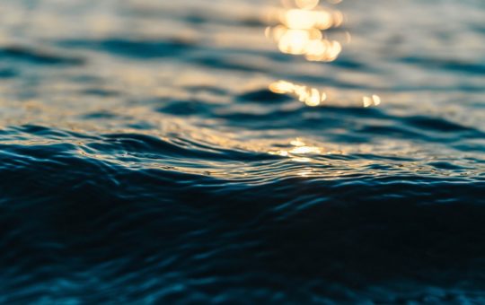 A closeup shot of ripples on the ocean surface