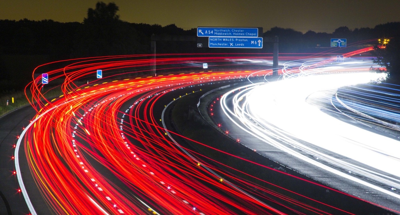 A blur of car headlights on a motorway