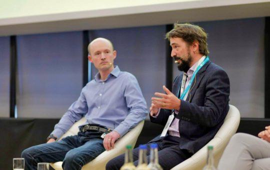 Professor Jean-Francois Mercure (right) and Simon Sharpe on a panel at the University of Exeter