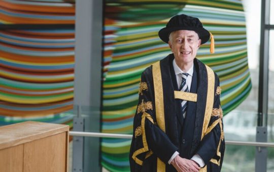 Sir Michael Barber wearing academic robes at the University of Exeter