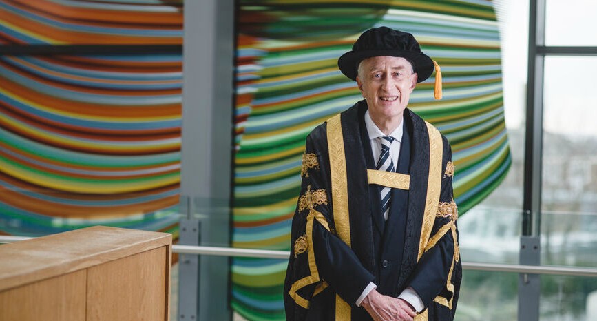 Sir Michael Barber wearing academic robes at the University of Exeter