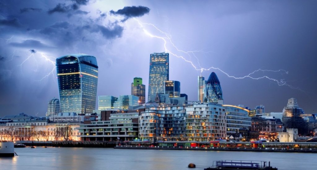 The City of London skyline, with forks of lightning in the sky