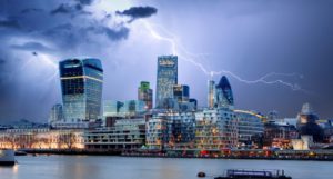 The City of London skyline, with forks of lightning in the sky
