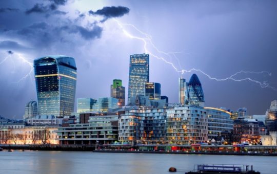 The City of London skyline, with forks of lightning in the sky
