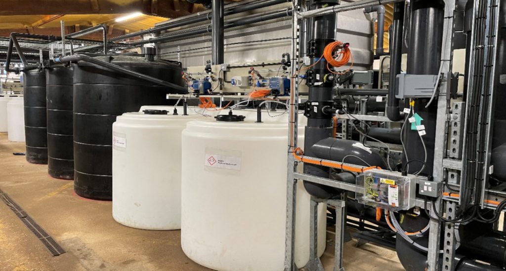 Large tanks and pipework in a warehouse - equipment used by the SeaCURE project