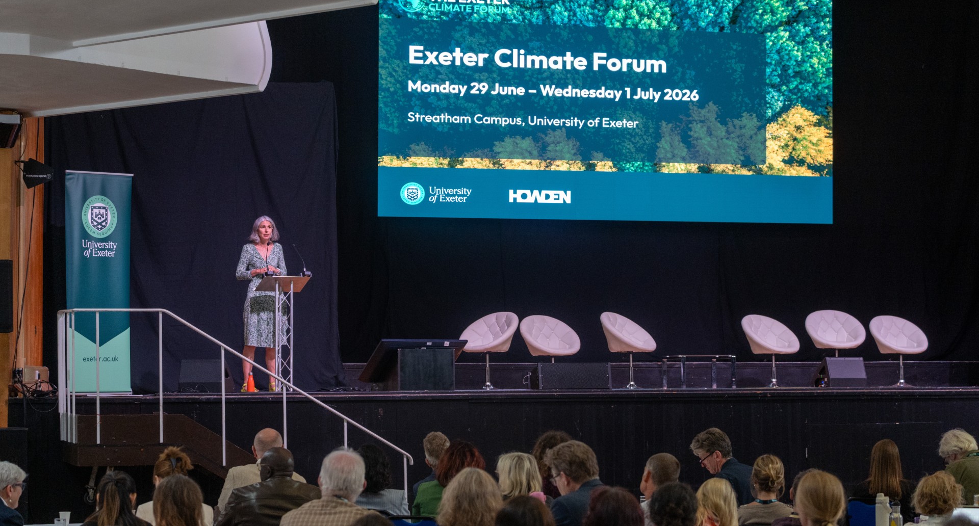 Rain Newton Smith on stage at the Exeter Climate Forum
